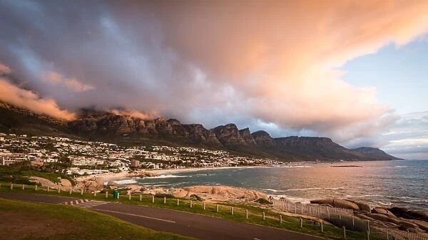 Sunset and clouds over Camps Bay, Table Mountain and the Twelve Apostles, Cape Town