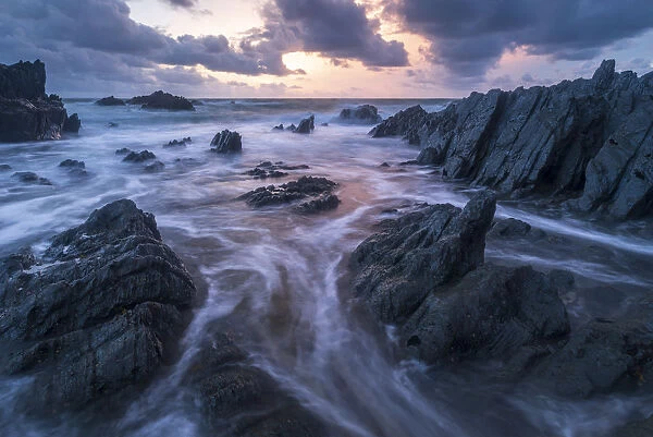 Sunset over the dramatic coastline of North Devon, England, United Kingdom, Europe