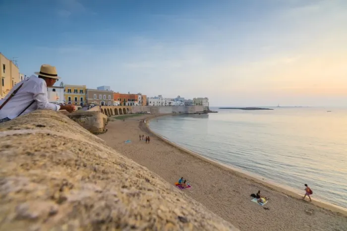Framed Print : Sunset frames the beach and the turquoise sea, Gallipoli, Province of Lecce, Apulia