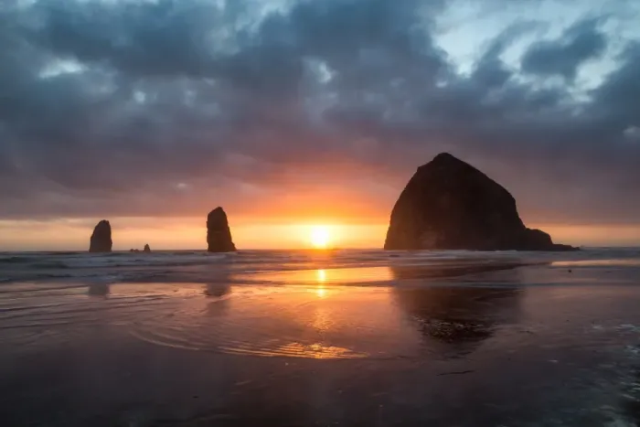 Framed Print : Sunset behind Haystack Rock at Cannon Beach on the Pacific Northwest coast, Oregon Framed Print : Sunset behind Haystack Rock at Cannon Beach on the Pacific Northwest coast, Oregon