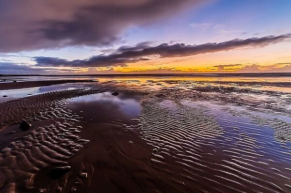 Sunset across the Irish Sea and Furness Peninsula, from Sandy Gap, Walney Island, Cumbrian Coast, Cumbria, England, United Kingdom, Europe