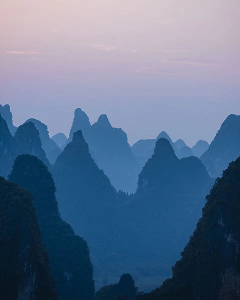 Sunset over Karst Hills from Lao Zhai, Xingping, Guilin, Guangxi Province, China, Asia
