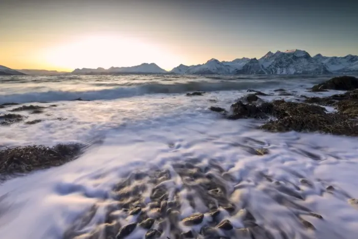 Framed Print : The sunset light reflected on the waves of cold sea crashing on the rocks, Djupvik Framed Print : The sunset light reflected on the waves of cold sea crashing on the rocks, Djupvik