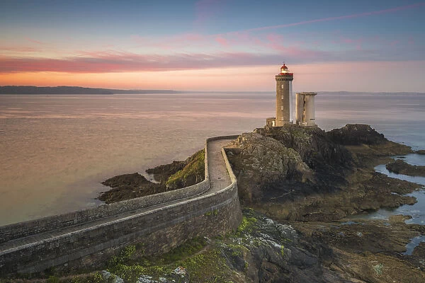 Sunset at lighthouse of Phare du Petit Minou in Finistere, Brittany, France, Europe