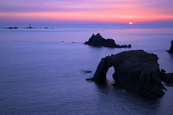 Sunset at Longships Lighthouse, Enys Dodnan and the Armed Knight, Lands End, Cornwall, England, United Kingdom, Europe