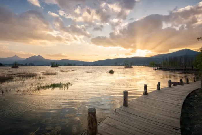Framed Print : Sunset over mountains, lake and boardwalk in Lijiang, Yunnan, China, Asia Framed Print : Sunset over mountains, lake and boardwalk in Lijiang, Yunnan, China, Asia