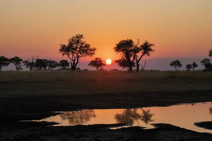 Framed Print : Sunset over the Okavango Delta, Botswana, Africa Framed Print : Sunset over the Okavango Delta, Botswana, Africa
