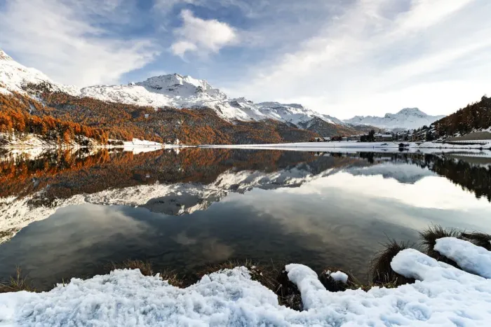 Framed Print : Sunset over Piz Da La Margna and Piz Corvatsch peaks reflected in lake Champfer during a