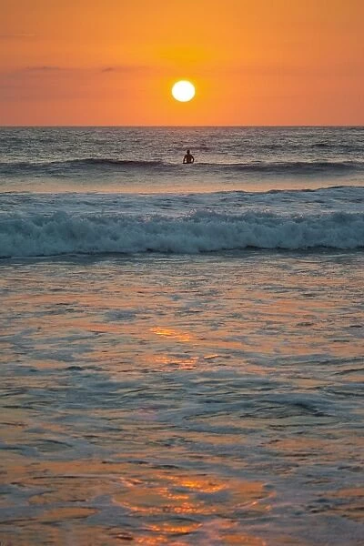 Sunset at Playa Guiones surfing beach, Nosara, Nicoya Peninsula, Guanacaste Province, Pacific coast, Costa Rica, Central America