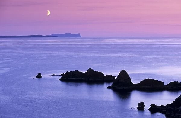 Sunset over Sand Wick and rising moon over Foula in distance