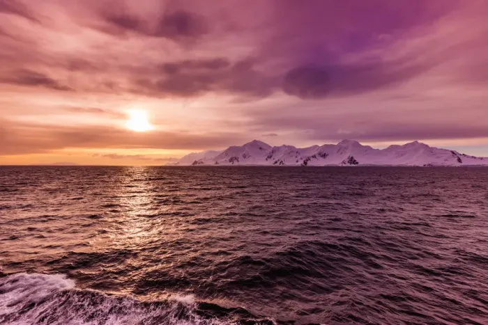 Framed Print : Sunset and a scenic view of the glacial ice and floating icebergs in Antarctica Framed Print : Sunset and a scenic view of the glacial ice and floating icebergs in Antarctica