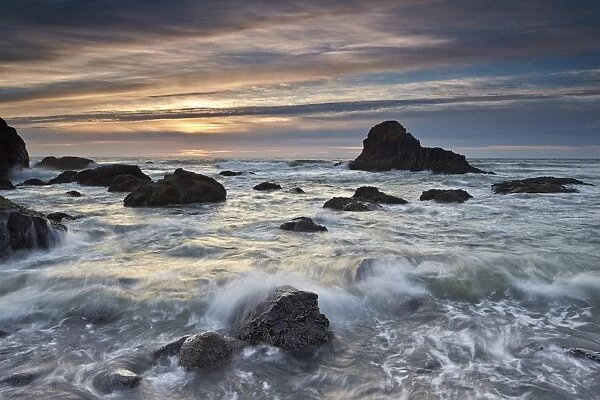 Sunset over sea stacks and surf, Ecola State Park, Oregon, United States of America, North America