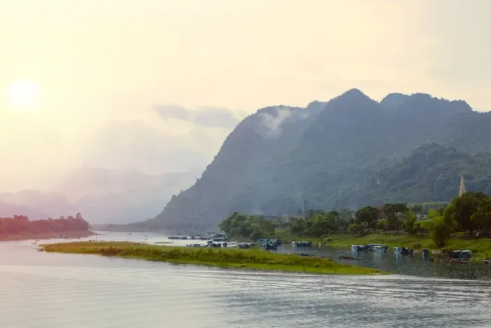 Framed Print : Sunset over the Son River in the Phong Nha Ke Bang National Park, Quang Binh, Vietnam Framed Print : Sunset over the Son River in the Phong Nha Ke Bang National Park, Quang Binh, Vietnam