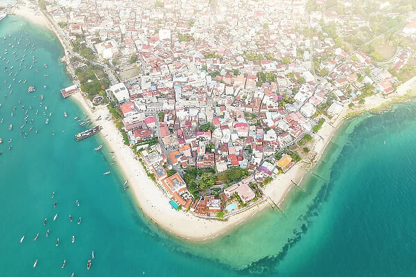 Sunset over Stone Town and waterfront, aerial view, Zanzibar, Tanzania, East Africa, Africa