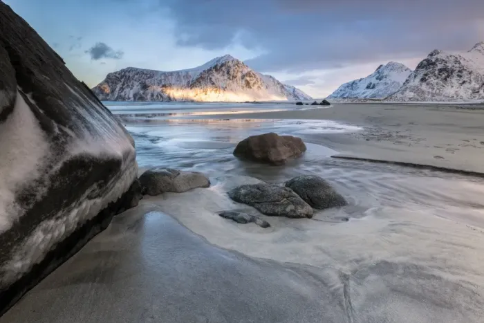 Framed Print : Sunset on the surreal Skagsanden beach surrounded by snow covered mountains, Flakstad Framed Print : Sunset on the surreal Skagsanden beach surrounded by snow covered mountains, Flakstad