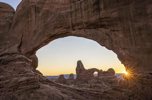 Sunset and Turret Arch view through Windows Arch, Arches National Park, Utah