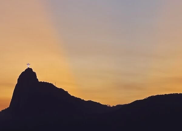 Sunset view of Christ the Redeemer statue and Corcovado Mountain, Rio de Janeiro