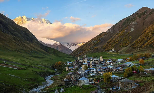 Sunset view of Ushguli, with Mount Shkhara covered in cloud, Mestia