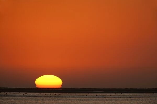 Sunset over Walvis Bay lagoon, Namibia, Africa