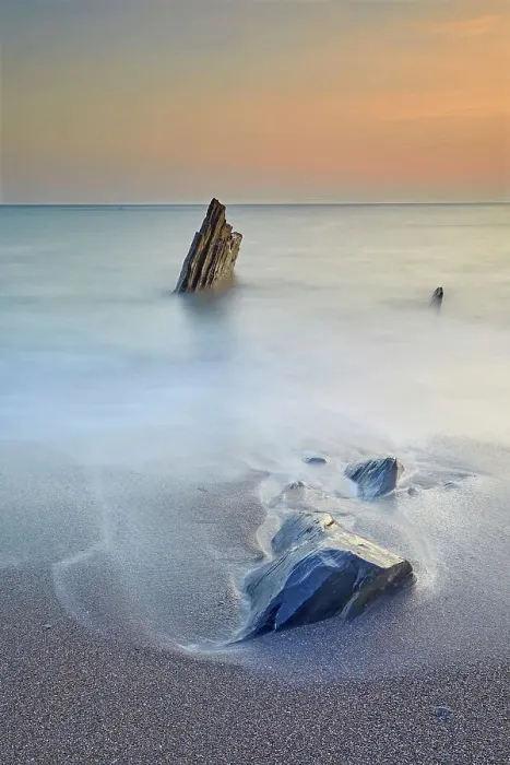 Framed Print : Surf rolls around shoreline rocks at sunset, in Ayrmer Cove, a remote cove near Kingsbridge, south coast of Devon, England, United Kingdom, Europe Framed Print : Surf rolls around shoreline rocks at sunset, in Ayrmer Cove, a remote cove near Kingsbridge, south coast of Devon, England, United Kingdom, Europe