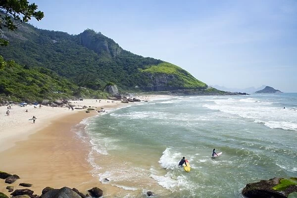 Surfers on Prainha beach, Barra da Tijuca, Rio de Janeiro, Brazil, South America
