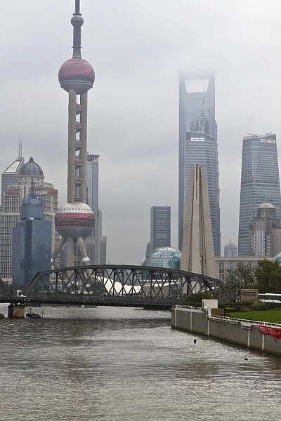 Suzhou Creek and the Waibaidu Bridge with view towards the Pudong skyline, Shanghai, China, Asia