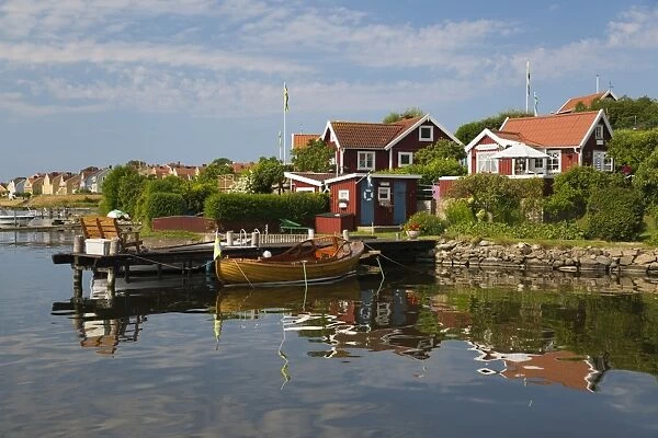 Swedish red summer houses in Brandaholm, Dragso Island, Karlskrona, Blekinge, South Sweden