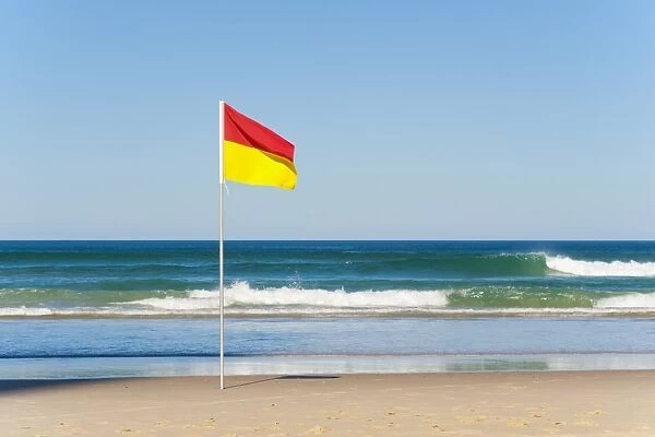 Swimming flag for satefy at Surfers Paradise beach, Gold Coast, Queensland, Australia, Pacific