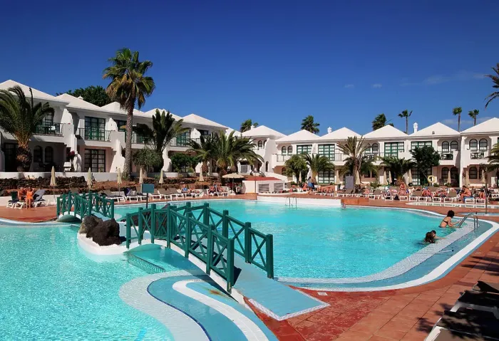 Framed Print : Swimming pool at H10 Ocean Suites hotel in Corralejo, Fuerteventura, Canary Islands, Spain, Atlantic, Europe Framed Print : Swimming pool at H10 Ocean Suites hotel in Corralejo, Fuerteventura, Canary Islands, Spain, Atlantic, Europe