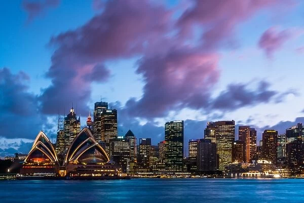 Sydney city skyline and harbour including the Opera House at dusk, Sydney, New South Wales