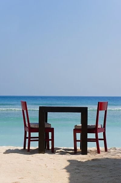 Table and chairs on the beach at a restaurant, Gili Trawangan, Gili Islands, Indonesia, Southeast Asia, Asia
