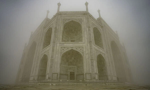 The Taj Mahal on a foggy morning, UNESCO World Heritage Site, Agra, Uttar Pradesh, India