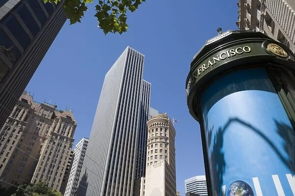 Tall buildings and advertising stand, Market Street, San Francisco, California