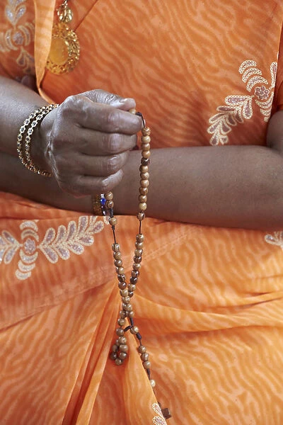 Tamil Catholic woman with rosary, Antony, Hauts-de-Seine, France, Europe