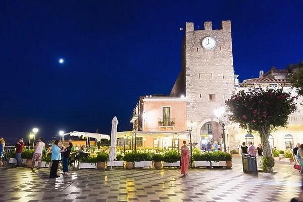 Taormina at night, the clock tower in Piazza IX Aprile on Corso Umberto, the main street in Taormina, Sicily, Italy, Europe