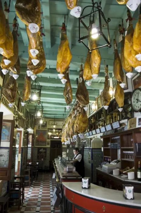 Framed Print : Tapas bar and restaurant with hams hanging from the ceiling Framed Print : Tapas bar and restaurant with hams hanging from the ceiling
