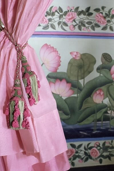 Tassels, pink curtains and painted walls