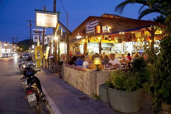 Taverna at dusk, Argassi, Zante, Ionian Islands, Greek Islands, Greece, Europe
