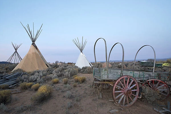 Teepees (tipis) on display at dusk in Taos, New Mexico, United States of America
