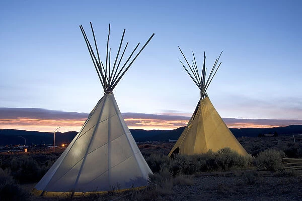 Teepees (tipis) on display at sunset in Taos, New Mexico, United States of America