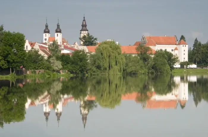 Framed Print : Telc Chateau and residential buildings reflected in Stepnicky Pond, Telc Framed Print : Telc Chateau and residential buildings reflected in Stepnicky Pond, Telc
