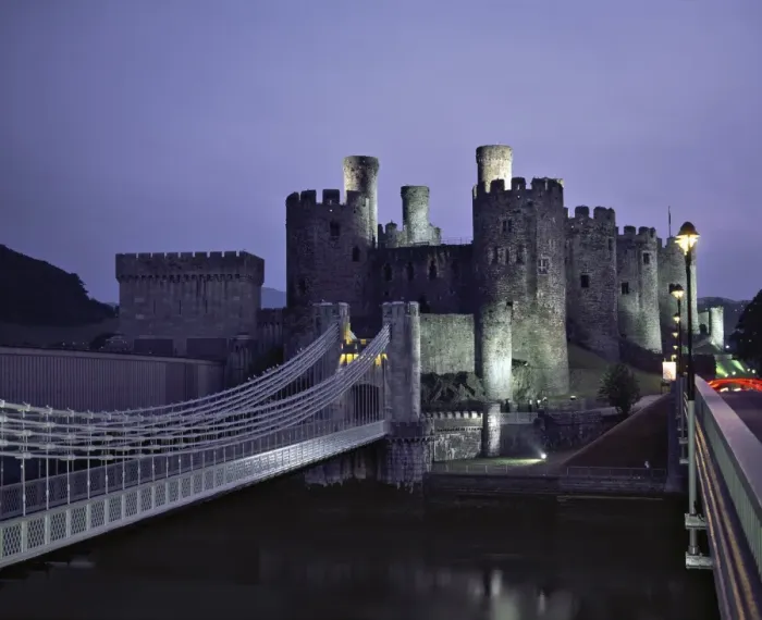 Framed Print : Telford Suspension Bridge at dusk, crossing the River Conwy, leading to Conwy Castle Framed Print : Telford Suspension Bridge at dusk, crossing the River Conwy, leading to Conwy Castle