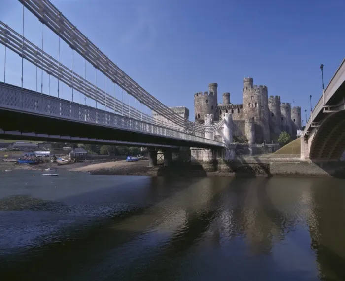 Framed Print : Telford Suspension Bridge, opened in 1826, crossing the River Conwy with Conwy Castle Framed Print : Telford Suspension Bridge, opened in 1826, crossing the River Conwy with Conwy Castle