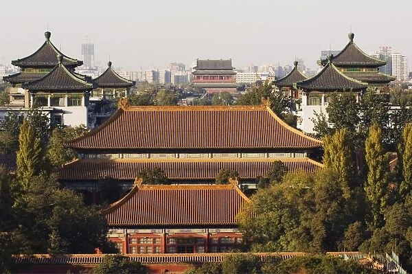 Temple buildings in Jingshan Park looking down to the Drum tower in the distance