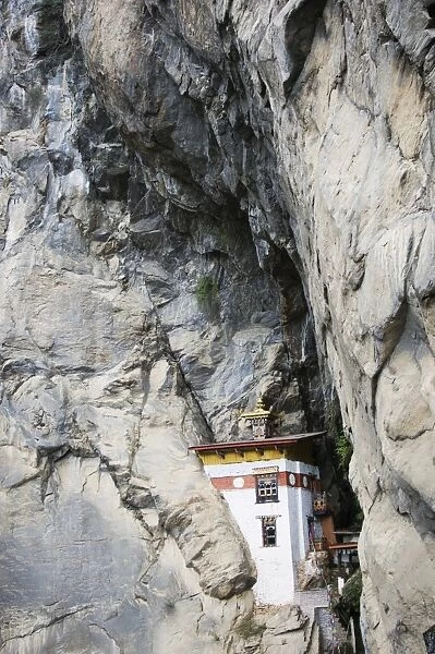 A temple built into the side of a cliff, Tigers Nest (Taktsang Goemba)