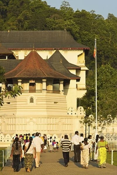 The Temple of the Sacred Tooth Relic (Temple of the Tooth) at sunset, a major tourist attraction