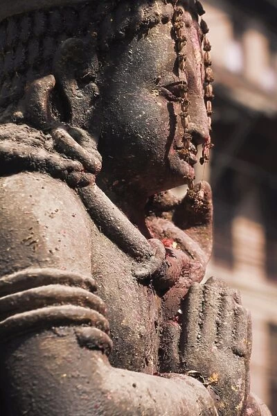Temple statue adorned with red pigment, Patan, Bagmati, Nepal, Asia