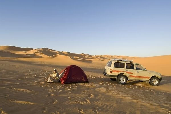 Tent and SUV in desert