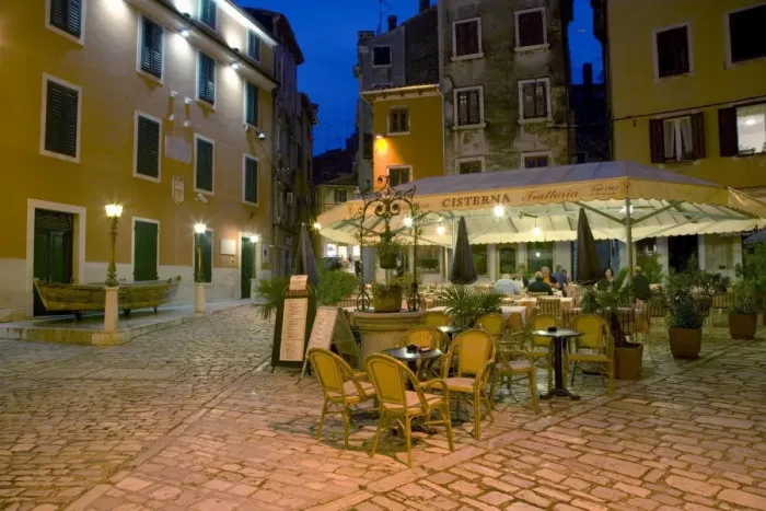 Framed Print : Terrace of attractive trattoria in the old town at dusk, Rovinj (Rovigno) Framed Print : Terrace of attractive trattoria in the old town at dusk, Rovinj (Rovigno)