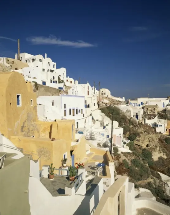 Framed Print : Terrace balconies and white houses of the village of Oia Framed Print : Terrace balconies and white houses of the village of Oia